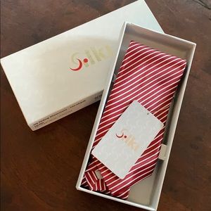 Silki tie. New in box.